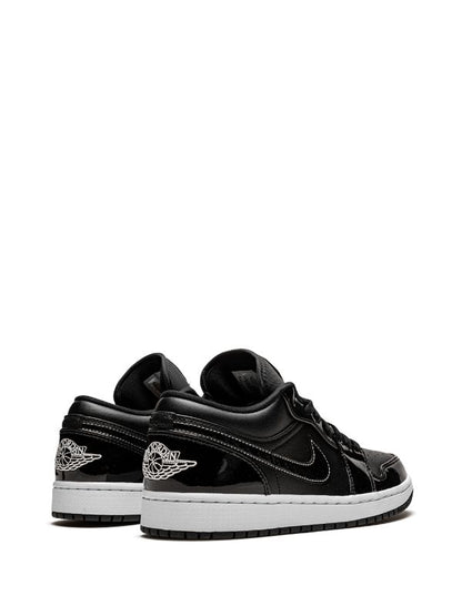 NIKE RETRO 1 LOW CHAROL NEGRO/BLANCO